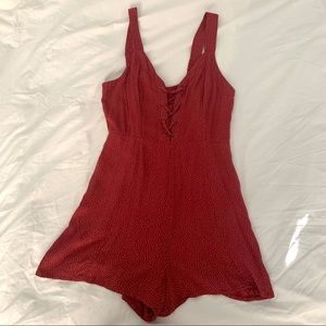 Red and white polka dot romper